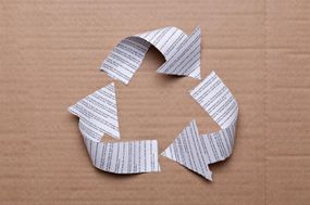 Recycle symbol on cardboard