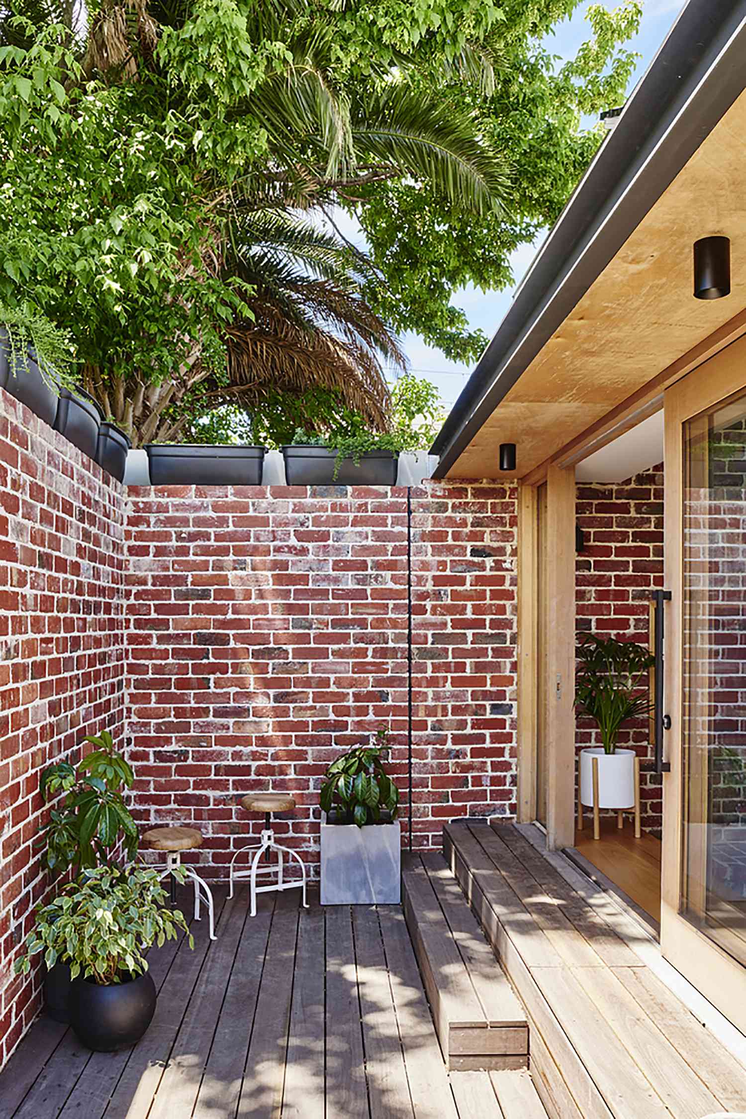 Gladstone Worker's Cottage Renovation by Altereco Design + Melbourne Vernacular brick wall