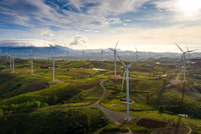 Wind turbine from aerial view in morning