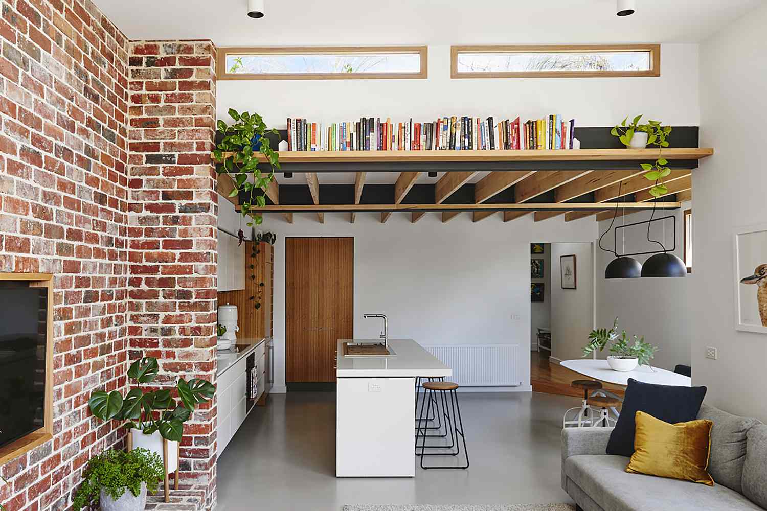 Gladstone Worker's Cottage Renovation by Altereco Design + Melbourne Vernacular kitchen and sitting area