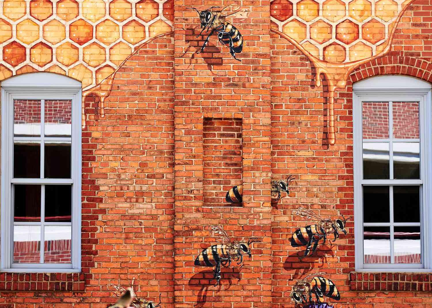 一只蜜蜂和蜂蜜壁画上的办公室伯特的蜜蜂。