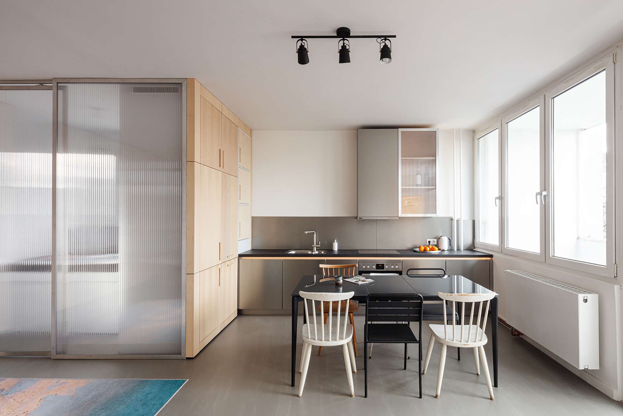 l'atelier Nomadic Architecture Studio厨房设计的住宅广场公寓