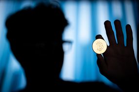 Cryptocurrency Bitcoin in hand